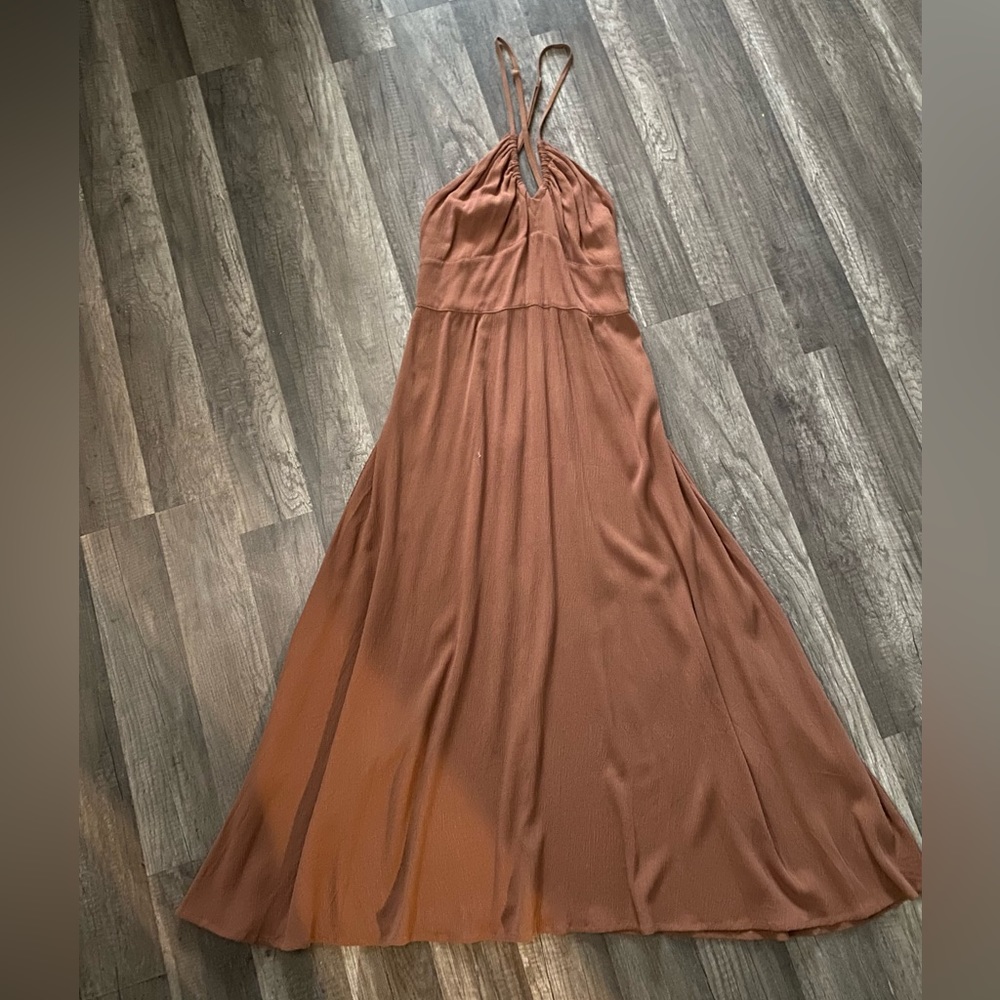 Women’s low v-neck long dress with a light brown color,size small.Only worn once